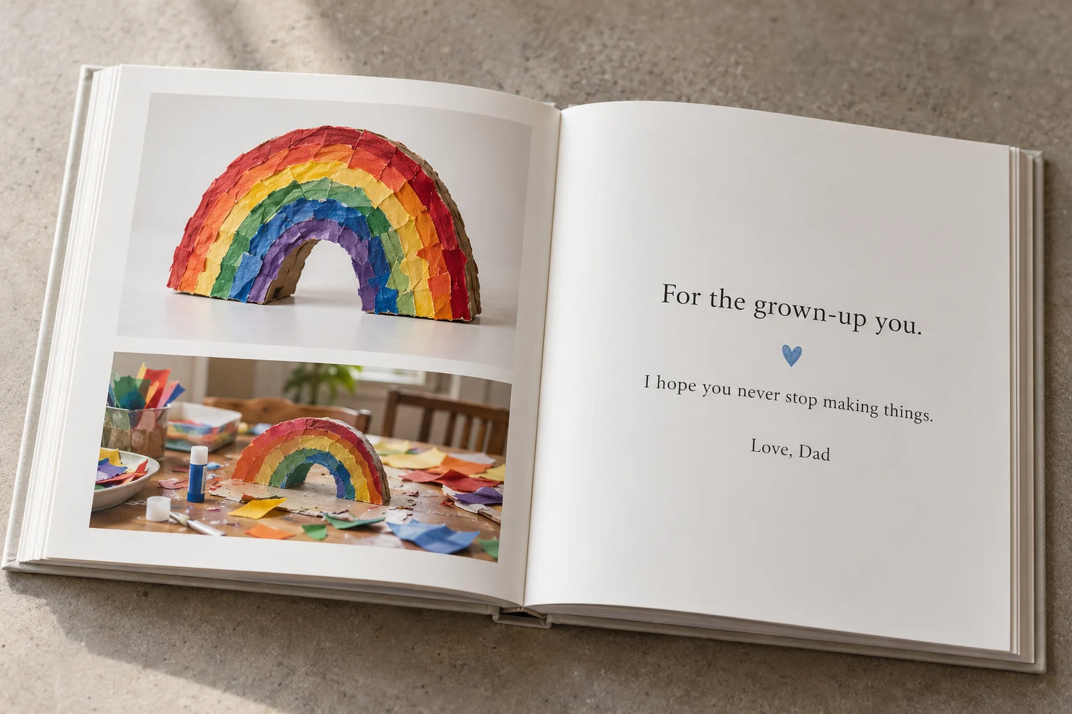 An open book pairs a rainbow craft with a making-of photograph and a closing note from Dad
